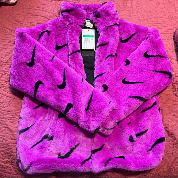 nike pink reversible teddy fleece with oversized swoosh